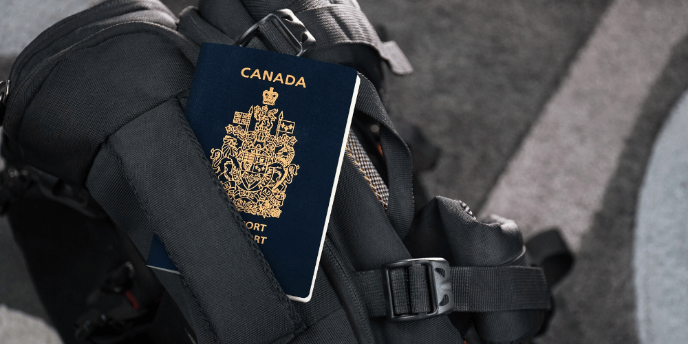 Canadian passport with luggage.