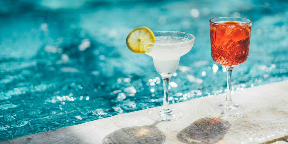 Summer cocktails beside a pool.