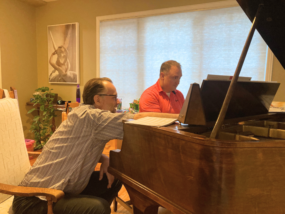 Ottawa-based piano teacher Tom Pechloff with a student.