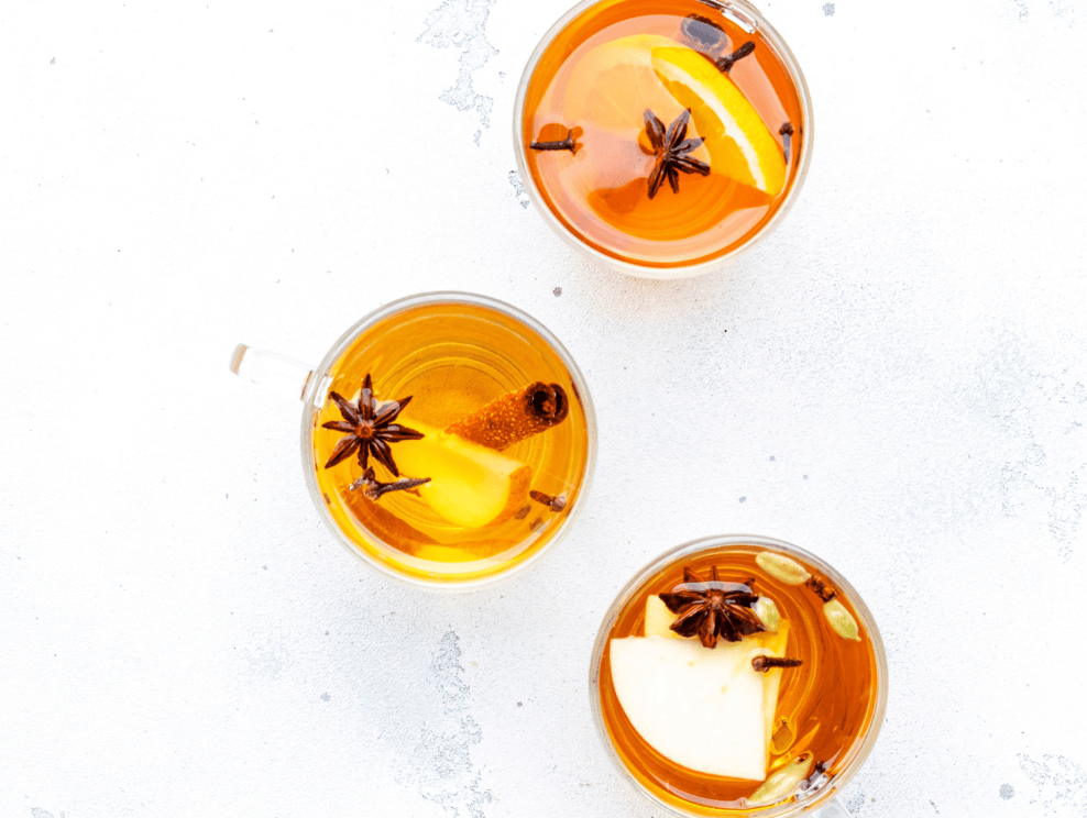 Prepared rum and apple punch on a marble counter.