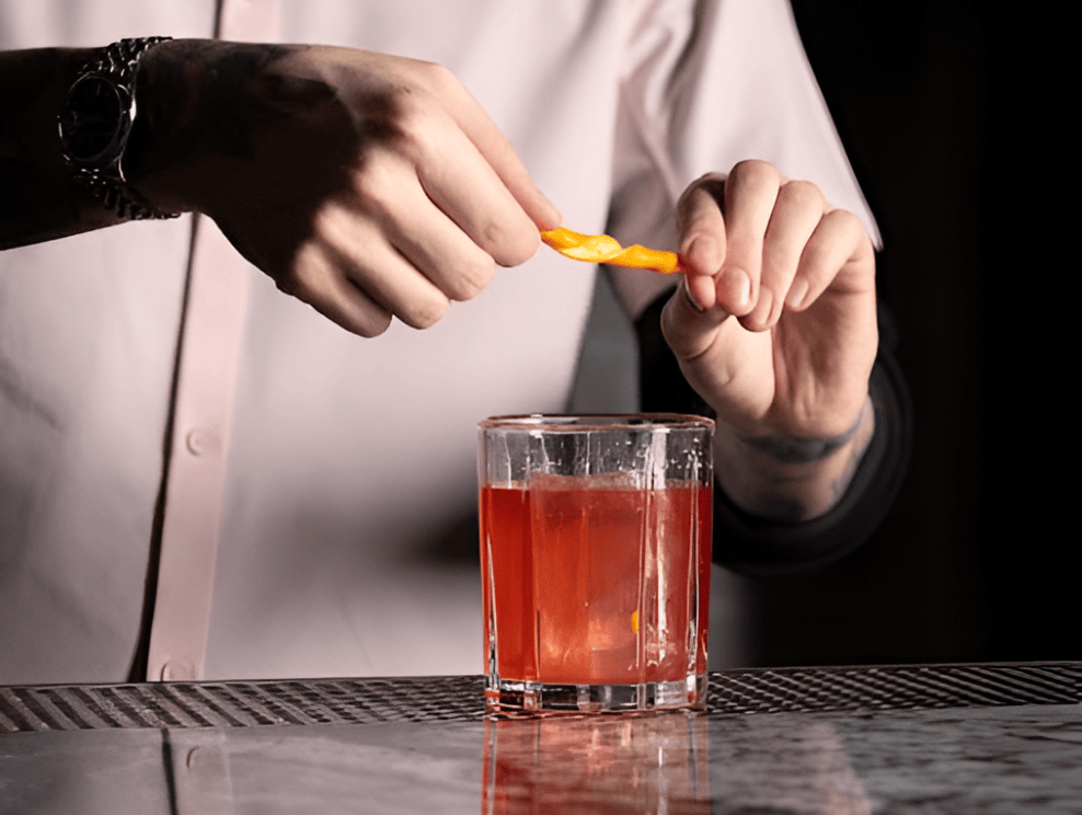 Stolen Goods bartender preparing the Bittered Red Thing.