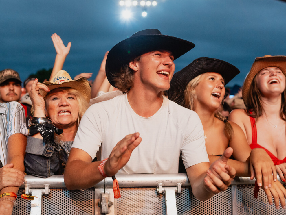 Fans sing along at the Boots and Hearts music festival.